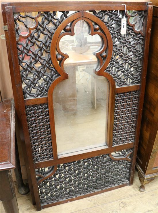 A set of three carved hardwood Moorish style wall mirrors W.67.5cm